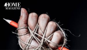 Hand and pen